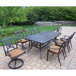 Willoughby 9-piece Dining Set, with Extendable Table, Sunbrella Cushioned Chairs, and Swivel Rockers