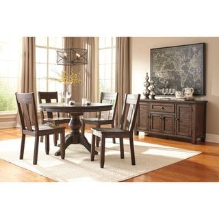 Signature Design by Ashley Trudell Dark Brown Table and Four Chairs Set