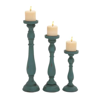 Set Of Three Rusty And Antique Candle Holders
