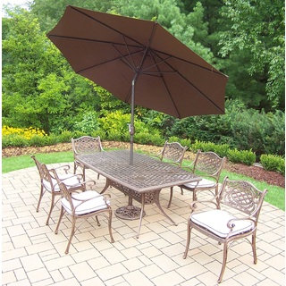 Merit Cast Aluminum 9-Piece Dining Set with Brown Umbrella and Metal Stand