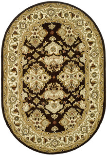 Safavieh Handmade Heritage Timeless Traditional Black/ Ivory Wool Rug (4'6 x 6'6 Oval)