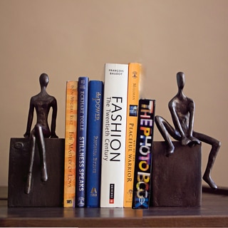 Man and Woman Sitting on a Block Metal Bookend Set