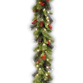 Crestwood Spruce 9-foot Garland with Silver Bristle, Cones, Red Berries and Glitter with 50 Clear Lights