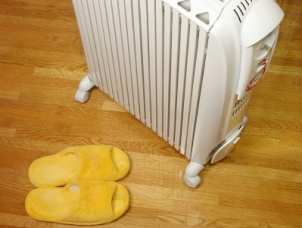 White space heater warms up bedroom and fuzzy slippers
