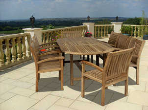 Wooden patio dining set dresses up tropical patio