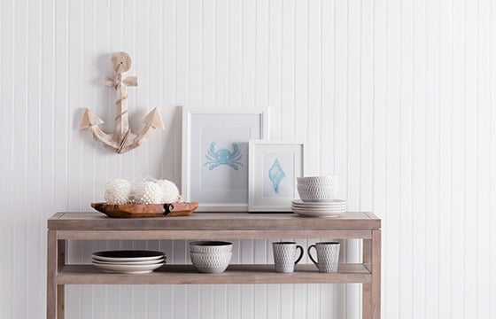Console table with nautical decor