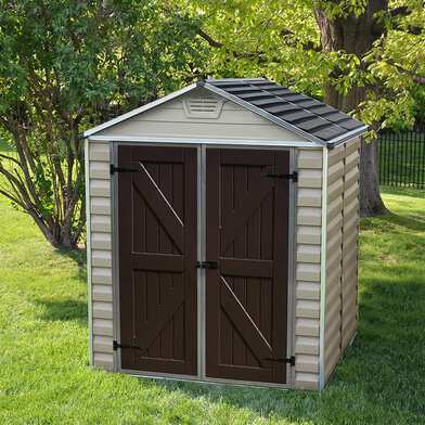 Grey plastic yard shed with brown double doors
