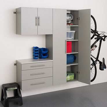 gray storage rack with drawers and cabinetsin garage