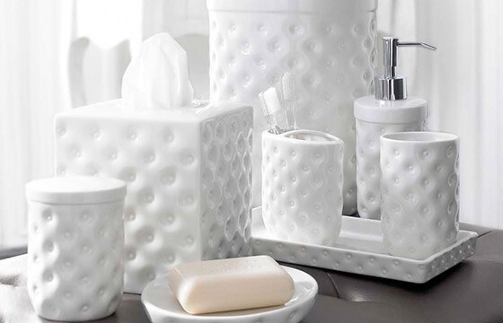A six piece classic white porcelain bath accessories set. 