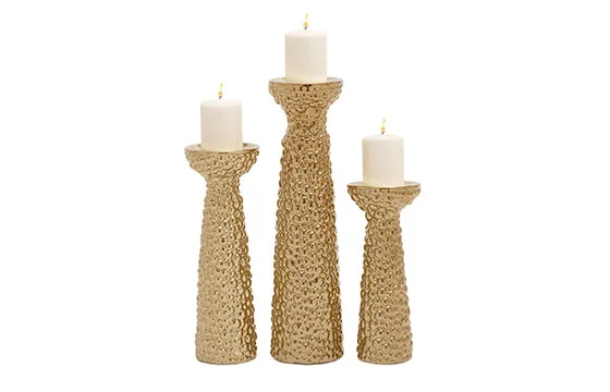 Set of three ceramic gold candle holders
