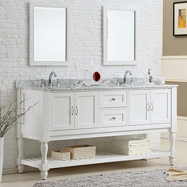 Double white vanity sinks shown in bathroom with cabinets