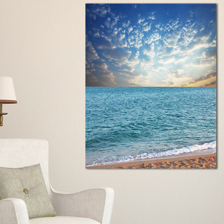 Fasting Moving Clouds Over Blue Beach - Modern Beach Canvas Art Print