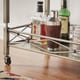 Metropolitan Antique Brass Metal Mobile Bar Cart with Glass Top by INSPIRE Q