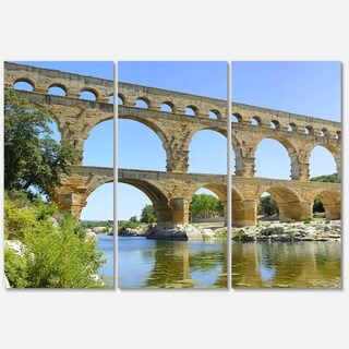 Designart 'Roman Aqueduct Bridge in France' Bridge Glossy Metal Wall Art