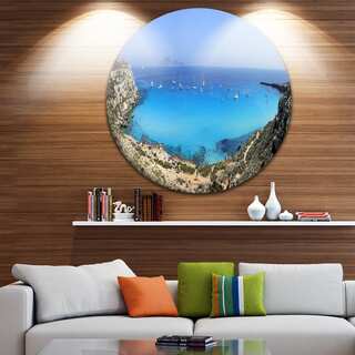 Designart 'Cala Rossa Beach Sicily Italy' Modern Seascape Disc Metal Artwork