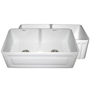 Reversible series fireclay sink with Raised Panel front apron on one side and fluted front apron on other