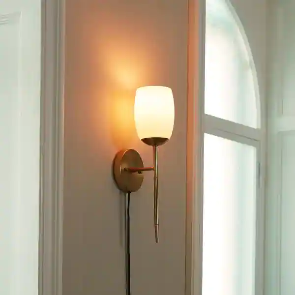 Novogratz x Globe Raoul 1-Light Matte Brass Plug-In or Hardwire Wall Sconce with Opal Glass Shade