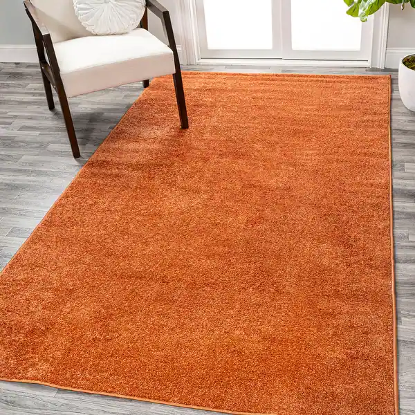 JONATHAN Y Tumbling Solid Low-Pile Area Rug