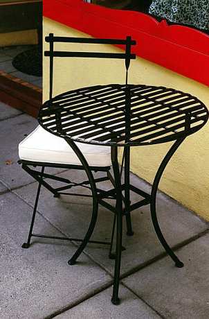 Wrought-iron table and chair