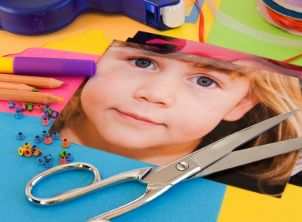 Scissors and photos are two essential scrapbooking supplies