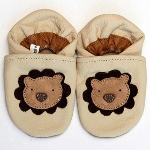 Slip-on baby shoes adorned with lions