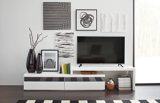 A gallery wall featuring abstract modern wall art 