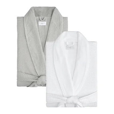 Folded white and gray cotton waffle print bathrobes